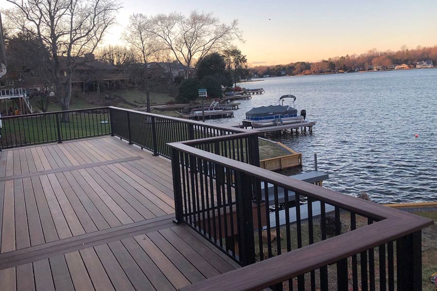 brown deck on back of home overlooking a lake fairfax va